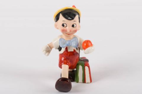 1950s Pinocchio Carrying an Apple Ceramic Figurine - ID: goebel0033pin Disneyana